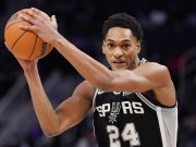 San Antonio Spurs guard Devin Vassell plays during the first half of a preseason NBA basketball game, Wednesday, Oct. 6, 2021, in Detroit.