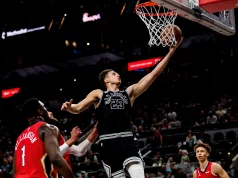 Zach Collins puts up a layup against the Pelicans in the game before the Spurs vs. Suns matchup