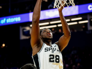 Charles Bassey scores for the San Antonio Spurs against the Golden State Warriors