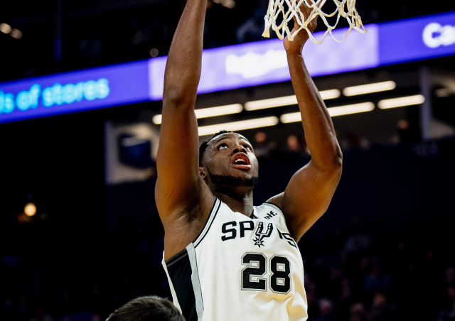 Charles Bassey scores for the San Antonio Spurs against the Golden State Warriors