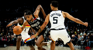 San Antonio Spurs on the court against the Timberwolves